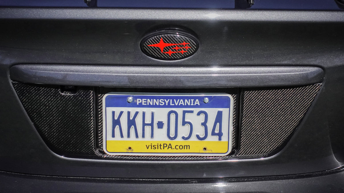 Noble Carbon Fiber License Plate Panel - 15-21 WRX / STI