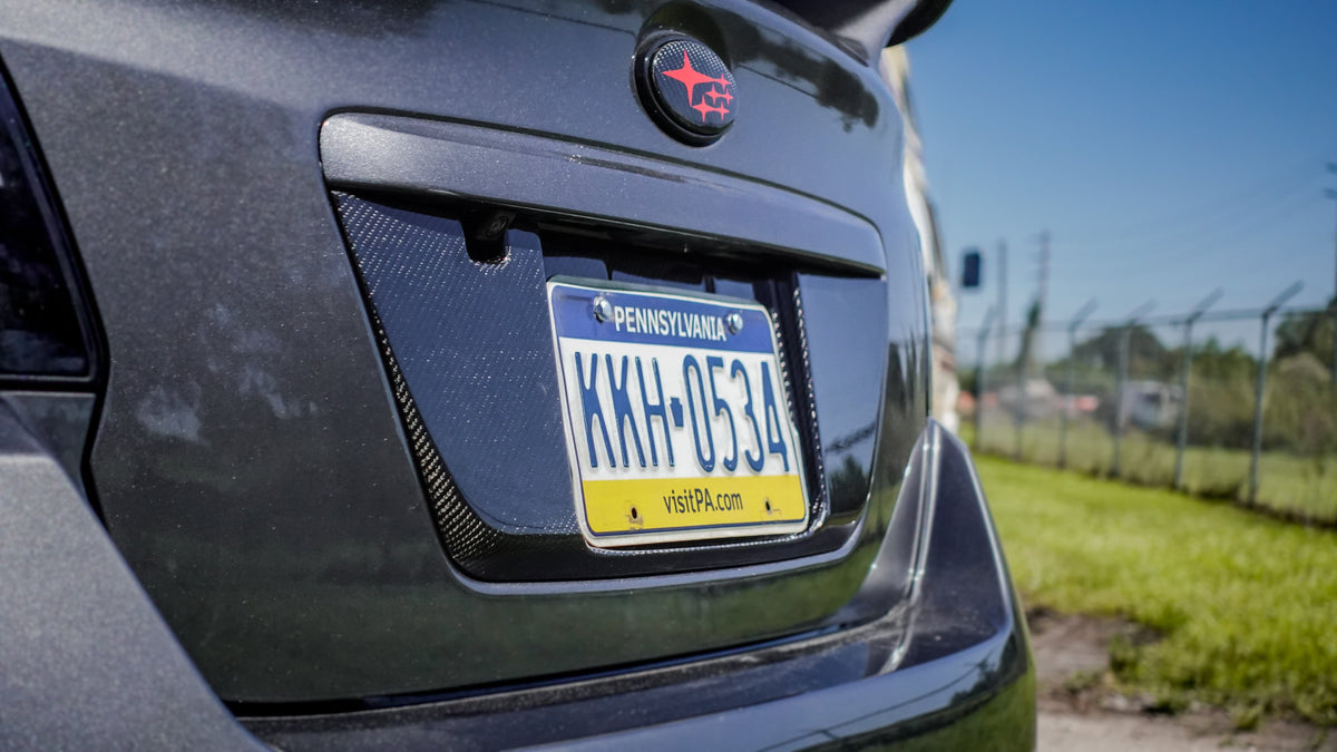 Noble Carbon Fiber License Plate Panel - 15-21 WRX / STI