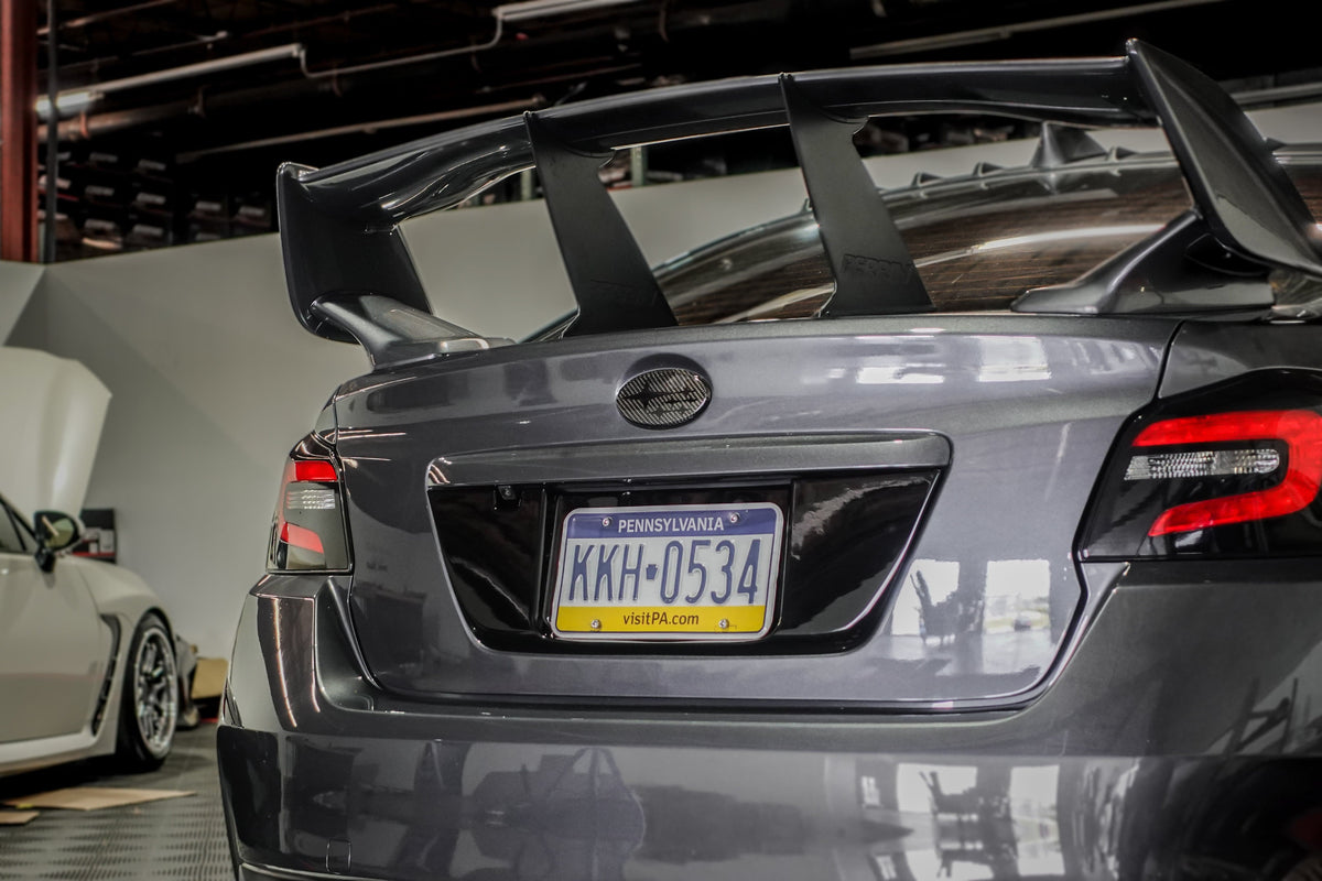 Noble Gloss Black License Plate Panel - 15-21 WRX / STI