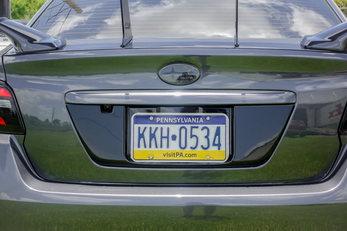 Noble Gloss Black License Plate Panel - 15-21 WRX / STI