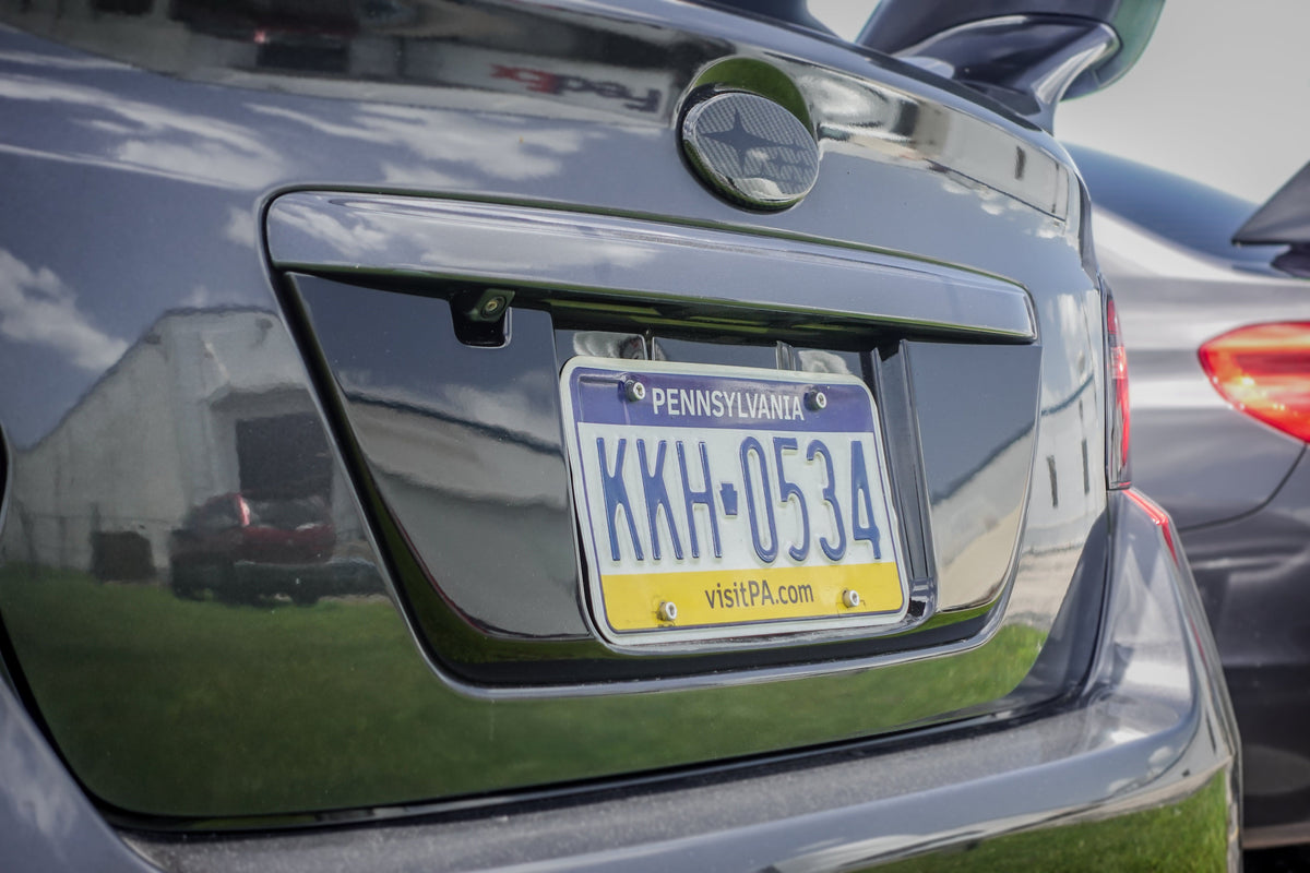 Noble Gloss Black License Plate Panel - 15-21 WRX / STI